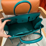 Side view of contemporary structured handbag