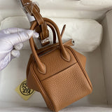 Side view of polished structured handbag