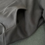 Flat lay presentation of Louis Vuitton luxury clothing with everyday silhouette