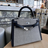 Signature crossbody bag carried on shoulder