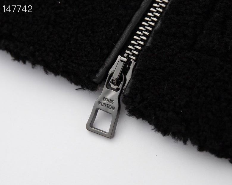 Full styled look of Louis Vuitton luxury clothing with signature branding