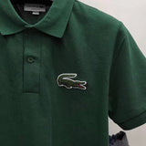Back view of Lacoste luxury clothing with signature branding