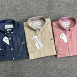 Back view of Lacoste luxury clothing with monogram-inspired silhouette