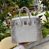  Chic top-handle bag carried on shoulder
