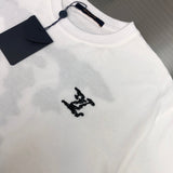 Close-up detail shot of Louis Vuitton cotton t-shirt with monogram-inspired silhouette