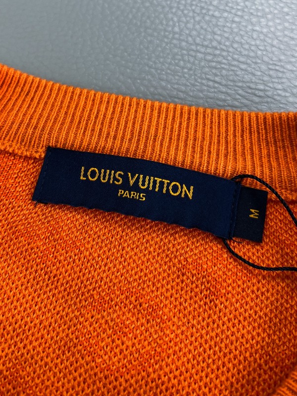 Front view of Louis Vuitton luxury clothing with monogram-inspired silhouette