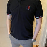 Front view of Moncler luxury clothing with tailored silhouette