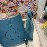 Side view of minimalist structured handbag