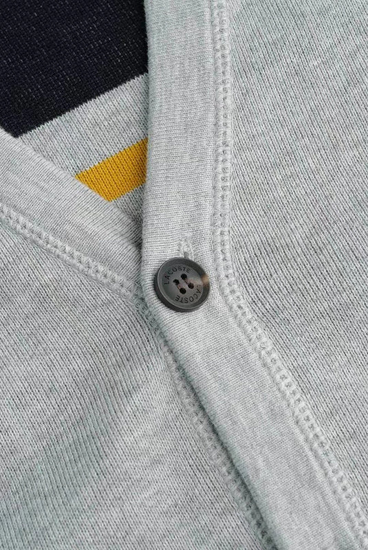 Full styled look of Lacoste luxury clothing with logo-detail design