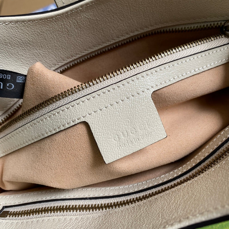 Side profile of sleek refined women's handbag – women's designer-style accessory