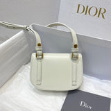 Handle and strap detail of statement structured women's handbag – women's designer-style accessory