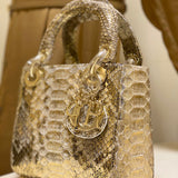 Styled lifestyle shot of polished sleek women's handbag – women's premium purse
