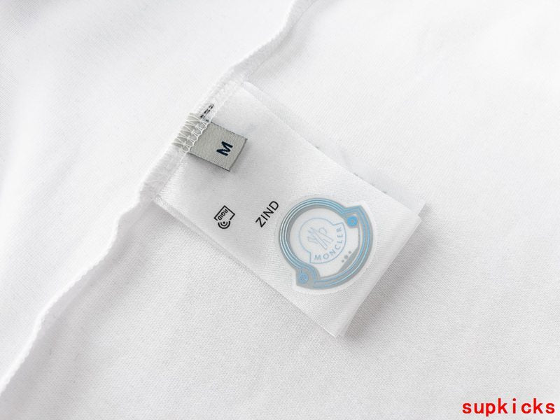 Side profile of Moncler luxury clothing with logo-detail design