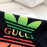 Side profile of Gucci luxury clothing with logo-detail design
