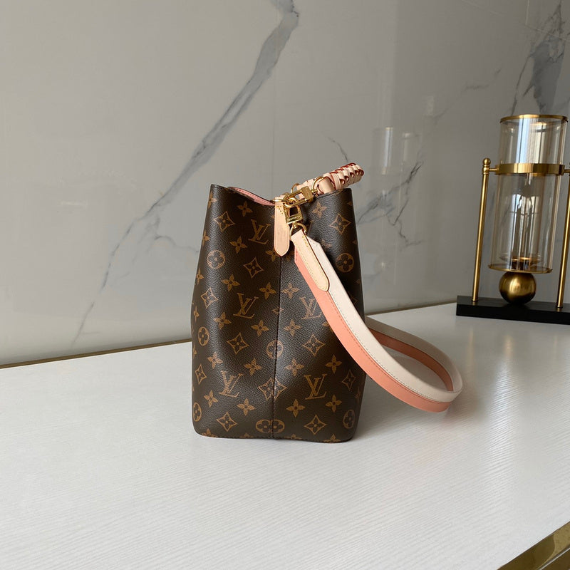 Top view of premium classic women's handbag – women's statement bag