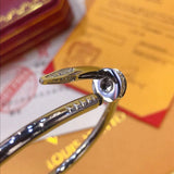 Close-up detail view of Cartier unisex jewelry piece