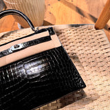 Side view of poised structured handbag