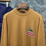Full styled look of Louis Vuitton luxury clothing with streetwear-inspired cut