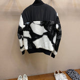Side profile of Louis Vuitton luxury clothing with everyday silhouette