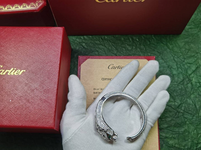 Angled view of Cartier unisex jewelry piece