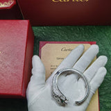 Angled view of Cartier unisex jewelry piece