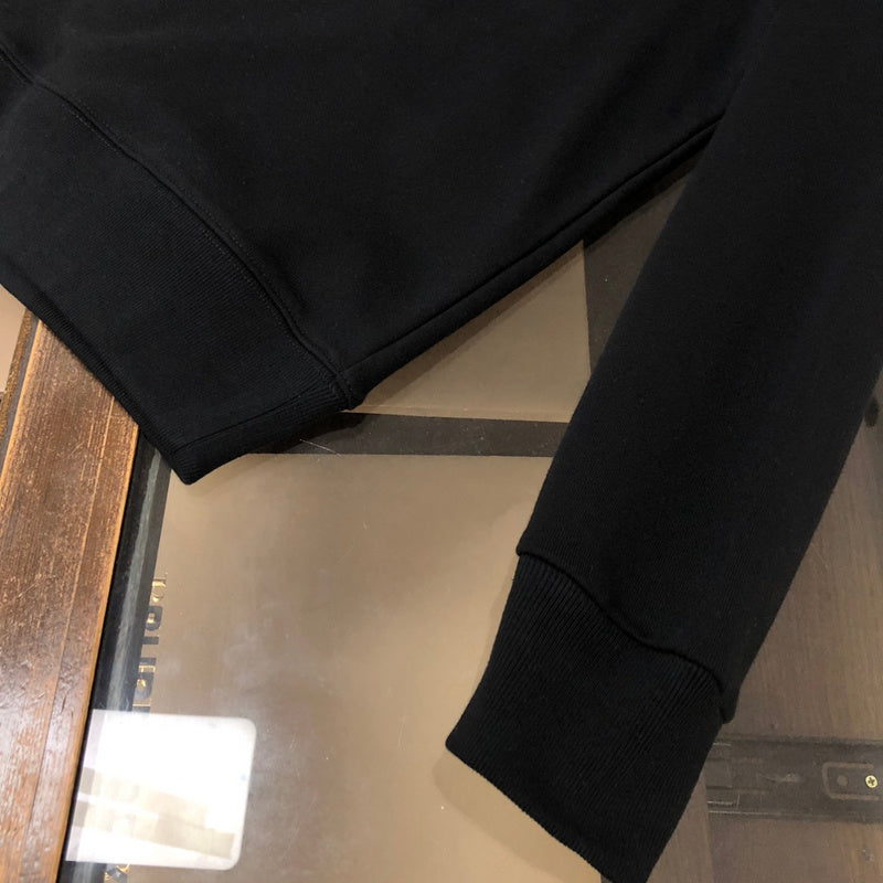 Back view of Louis Vuitton luxury clothing with tailored silhouette