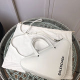 Back view of chic polished women's handbag – women's designer-style accessory