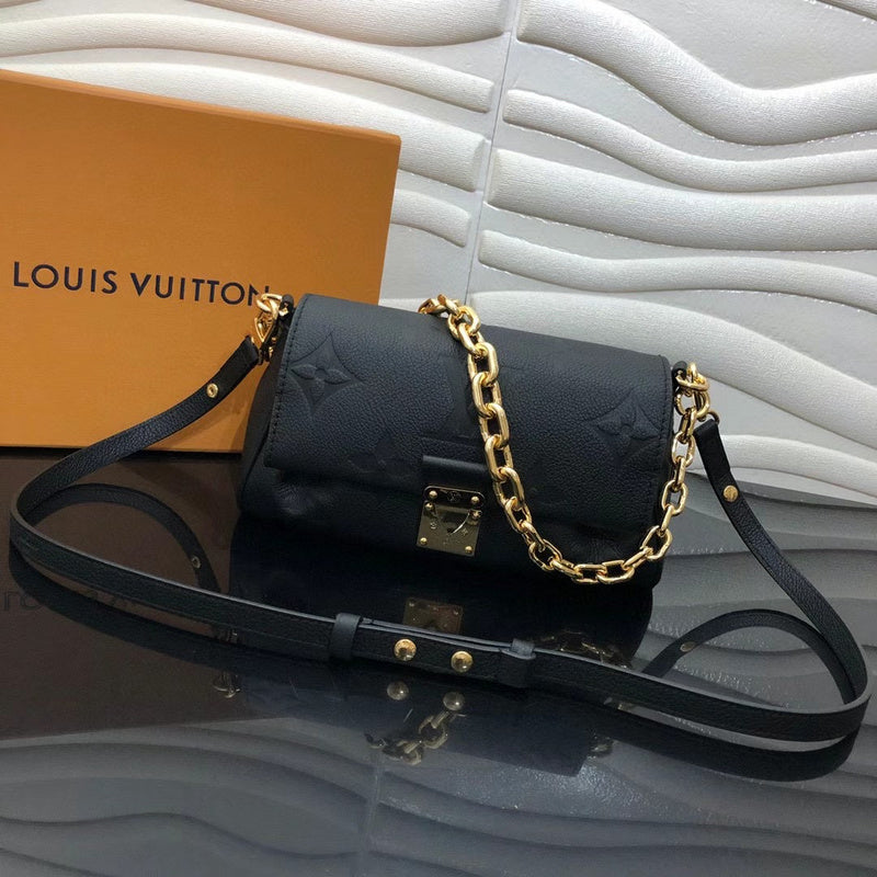 Front view of polished signature women's handbag – women's luxury handbag