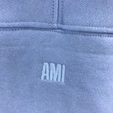Three-quarter angle view of Amiri luxury piece style No.052