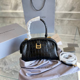 Ziva's Charm handbag – carry view (one versatile size)