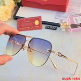 Close-up detail view of Cartier unisex sunglasses