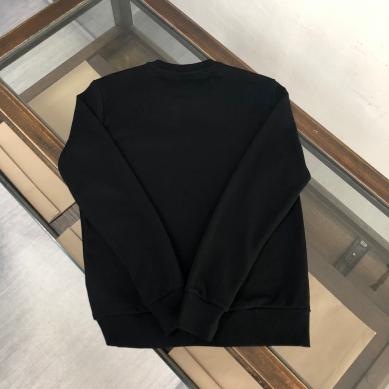Close-up detail shot of Givenchy luxury clothing with contemporary cut