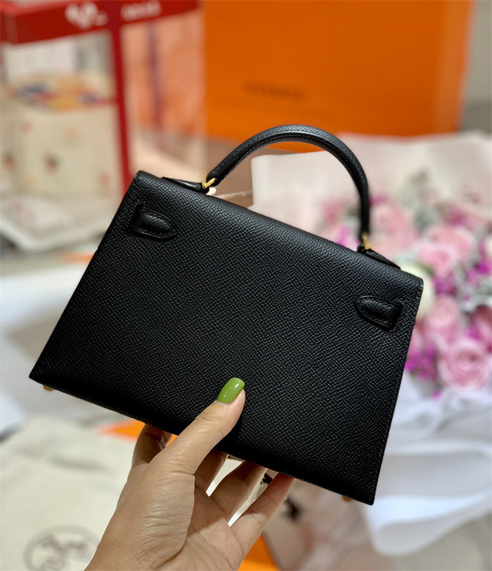Side view of tailored structured handbag