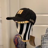 Close-up detail view of Burberry unisex cap
