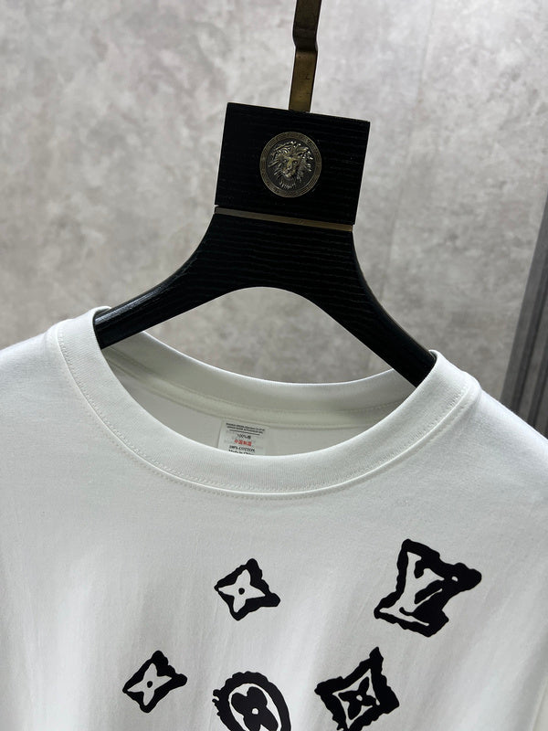 Close-up detail shot of Louis Vuitton luxury clothing with monogram-inspired silhouette