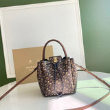 Ziva's Charm handbag – side angle view (one versatile size)