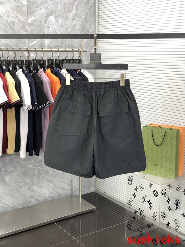 Side profile of Rhude luxury clothing with logo-detail design