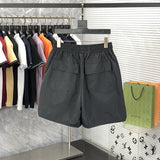 Side profile of Rhude luxury clothing with logo-detail design
