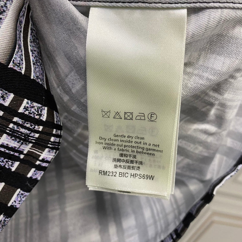 Front view of Louis Vuitton luxury clothing with streetwear-inspired cut