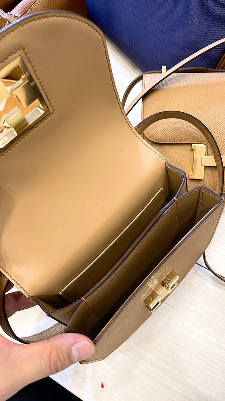 Side view of classic structured handbag