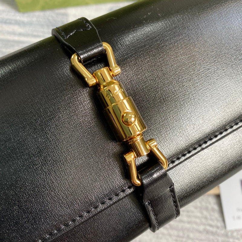 Handle and strap detail of polished chic women's handbag – women's everyday handbag