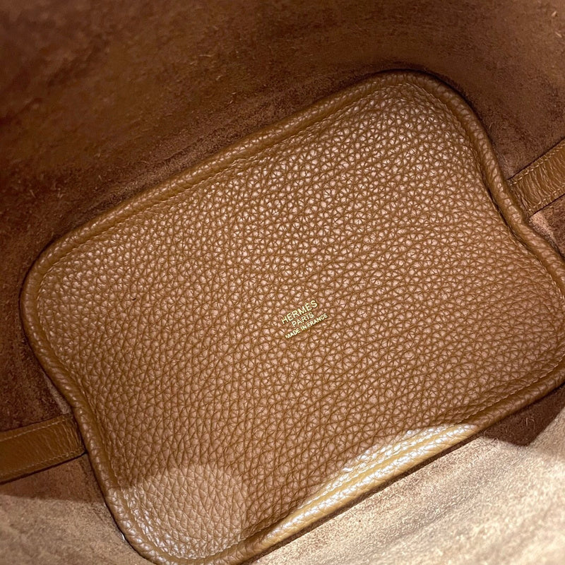 Side view of streamlined structured handbag
