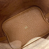 Side view of streamlined structured handbag