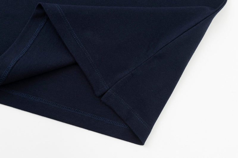 Close-up detail shot of Polo cotton polo shirt with logo-detail design