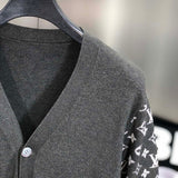 Close-up detail shot of Louis Vuitton luxury clothing with signature branding