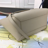 Side profile of signature structured women's handbag – women's premium purse