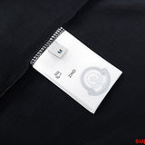 Back view of Moncler luxury clothing with monogram-inspired silhouette