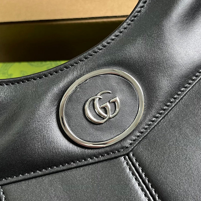 Back view of statement classic women's handbag – women's luxury accessory