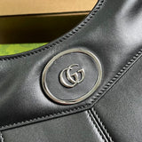 Back view of statement classic women's handbag – women's luxury accessory