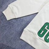 Full styled look of Gucci luxury clothing with signature branding